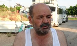 2 torununu alevlerin arasından çekip çıkardı