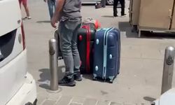 Yolda bagaj indirme kavgası