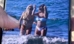 Plajda kadınların fotoğraflarını çekti