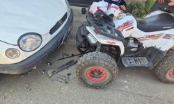 ATV park halindeki otomobile çarptı