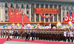 Şi Cinping ve Kim Jong Un bir araya geldi