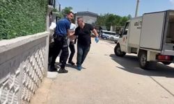 Tartıştığı eşini oğlunun gözü önünde öldürdü