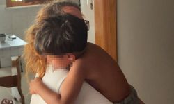 İtfaiye başı demir kapıya sıkışan çocuğu kurtardı
