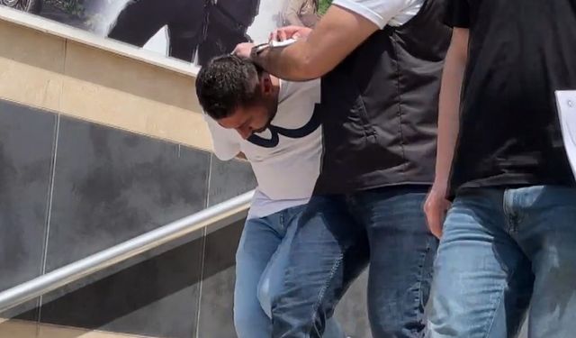 Kendisini oğlu olarak tanıtıp yaşlı kadını dolandırdı
