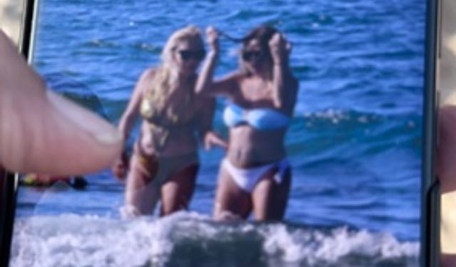 Plajda kadınların fotoğraflarını çekti