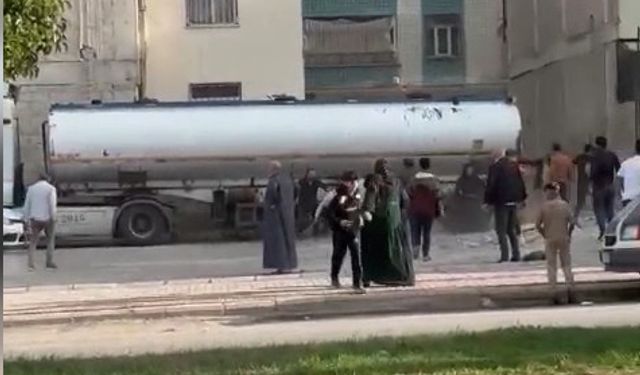 Komşuların taşlı sopalı kavgası kamerada