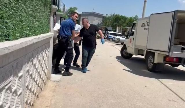Tartıştığı eşini oğlunun gözü önünde öldürdü
