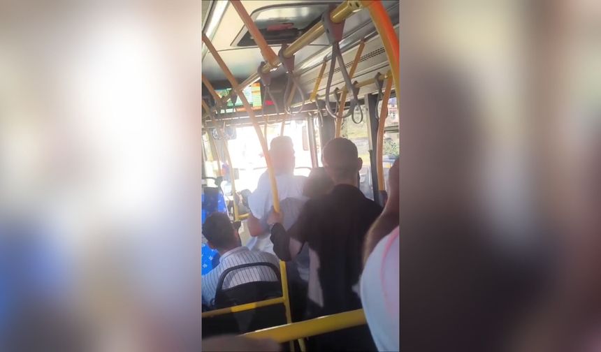 Özel halk otobüsünde yumruk yumruğa kavga